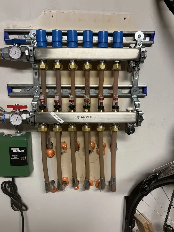 Plumber performing Water Heater Repair at a residential property in Underwood-Petersville