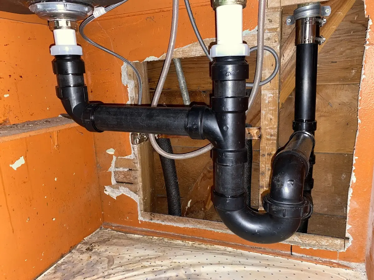 Professional Garbage Disposal Repair equipment and tools on the job in Underwood-Petersville